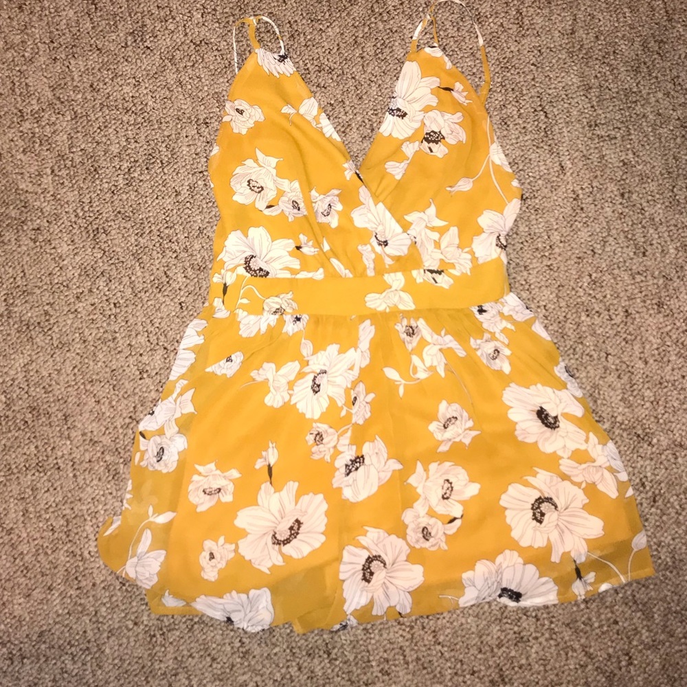 Boutique yellow romper with white flowers